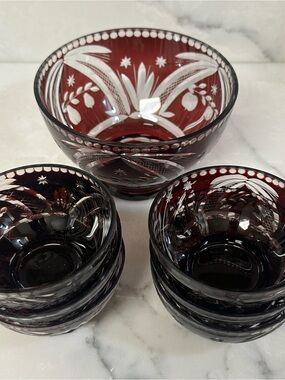 This is a vintage Bohemian ruby red cut-to-clear crystal berry/dessert bowl set.